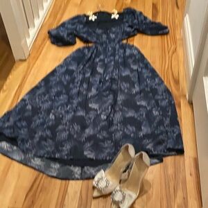 Beautiful wedding guest tropics navy subtle pattern long with puffy sleeves